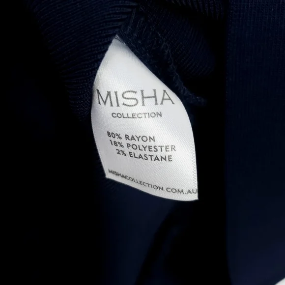 Misha collection cap sleeve ruffle bottom navy dress size 8